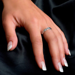 Silver ring, intertwined design